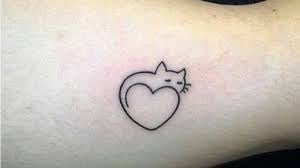 13 Tatuajes Significativos en honor a esos bellas mascotas felinas con un corazon
