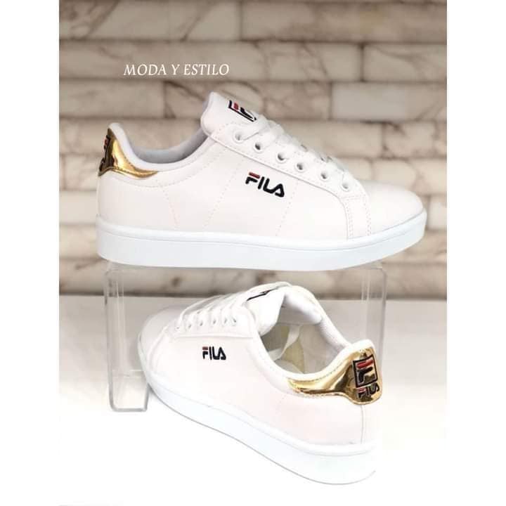 136 Fila 2634 gold details on the heel with the Fila logo