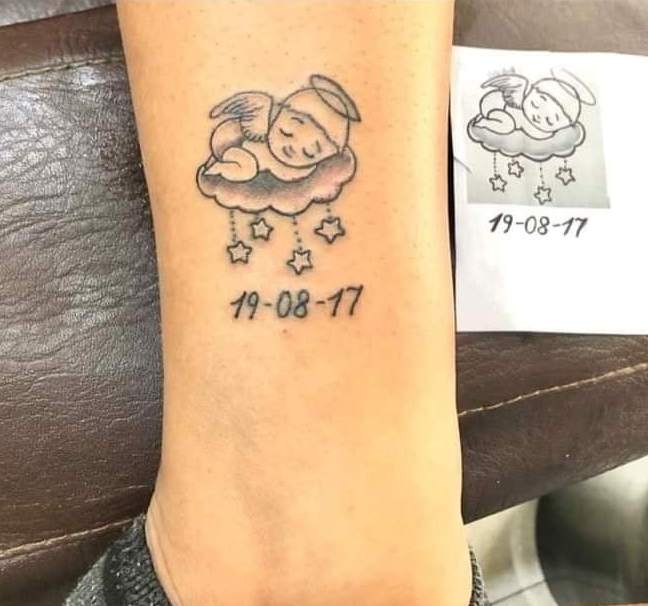 17 Original Tattoos Angelito Sleeping on a cloud date and stars on the calf
