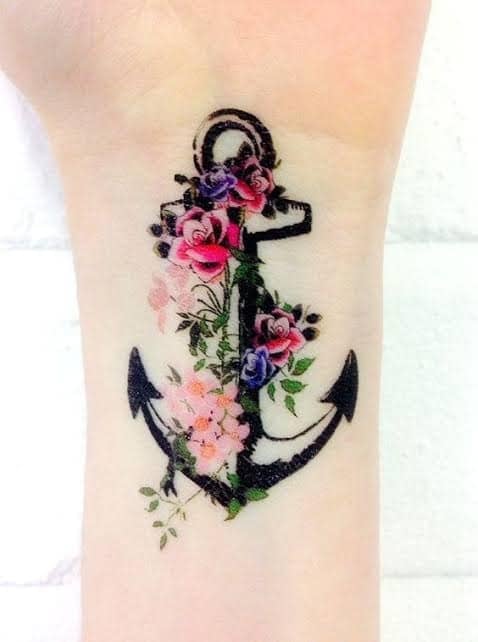 5 TOP 5 Ideas of Cute Tattoos Wide in Black with Flowers Light Pink Violet Roses Twigs and Green Leaves Realistic on the wrist