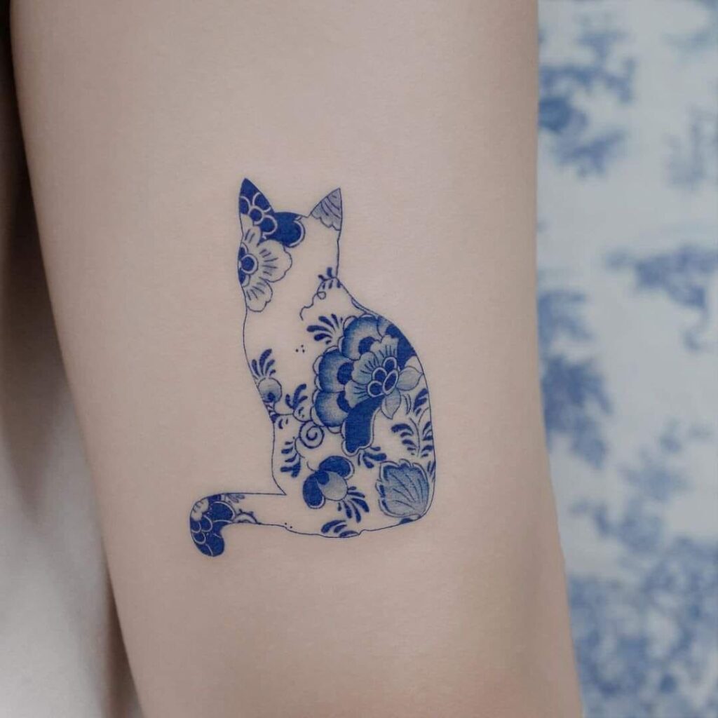 77 Tattoos with Blue Ink Outline of Cat with Flowers