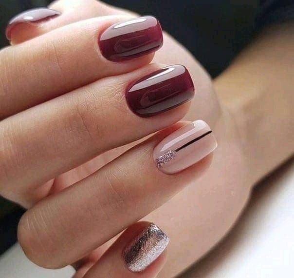 103 Short wine-colored nails, some pink with black lines and silver glitter