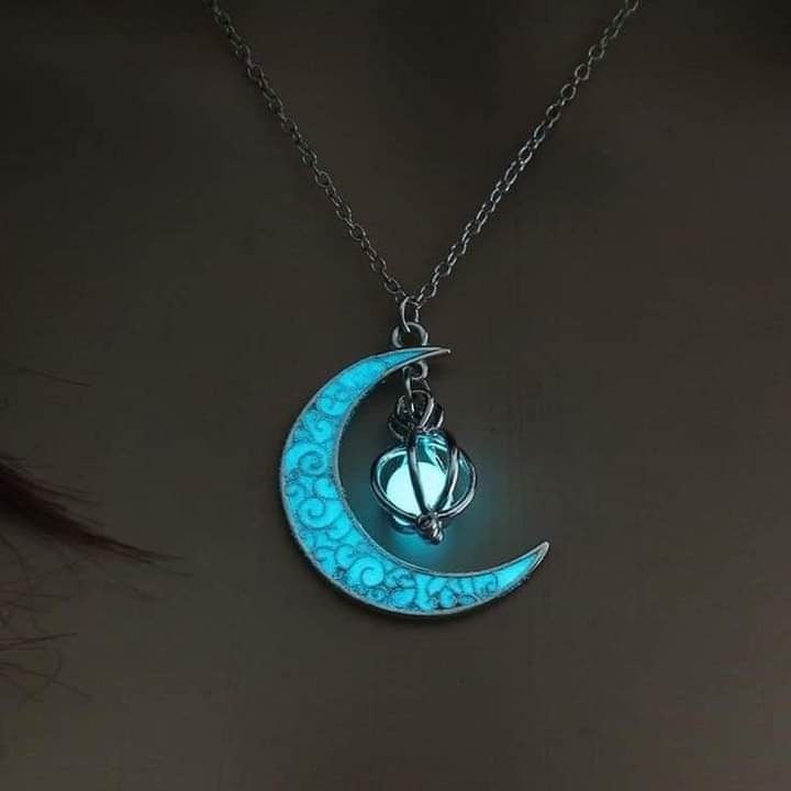 116 Pendant in the Shape of a Moon with a pendant with a sphere inside that glows in the dark Celestial