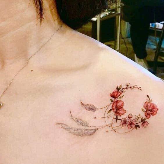 12 Female Semi Circle Tattoos of Red Flowers with Feathers on Shoulder