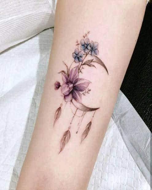 20 Feminine Crescent Tattoos with Violet and Blue Flowers and feathers