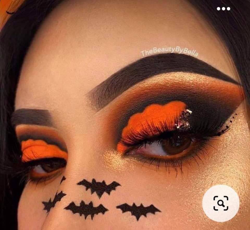 22 Halloween-Make-up-Fledermäuse, gezeichnet mit dem Nasen-Lidschatten Orange Pumpkin Brown über den Augenbrauen