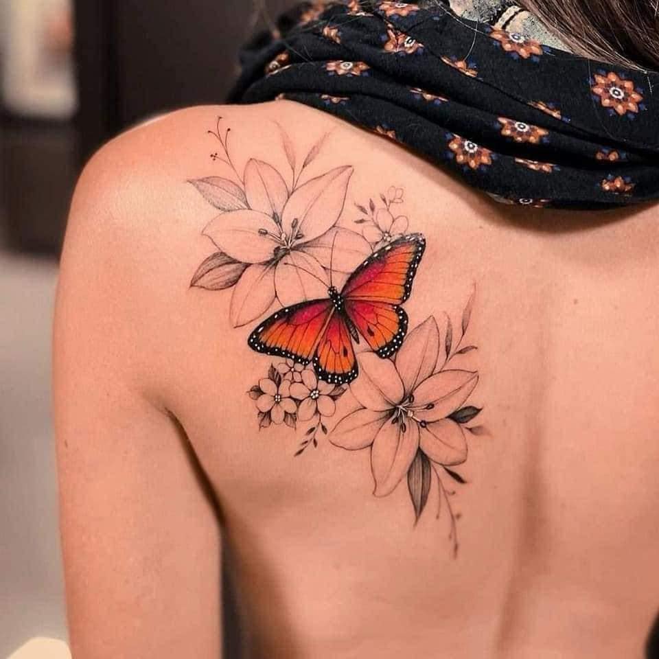 3 TOP 3 Female Tattoos Emperor Butterfly Orange with black flowers with black fine line on the left shoulder blade
