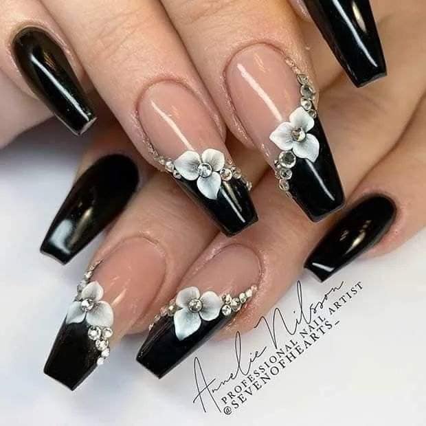 34 Brilliant black nails with flowers rhinestones with brilliant salmon-colored background