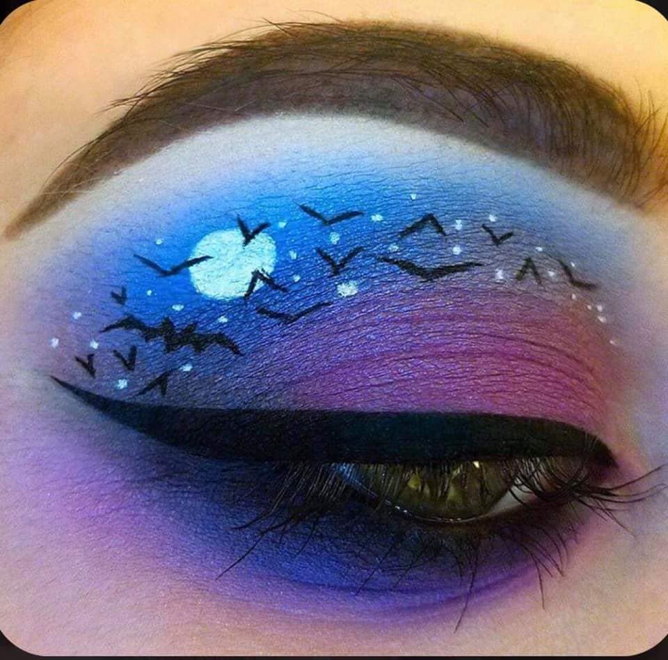 35 Halloween Makeup Degraded leftover in Purple and Blue with White Moon and Black Bats above the Eye