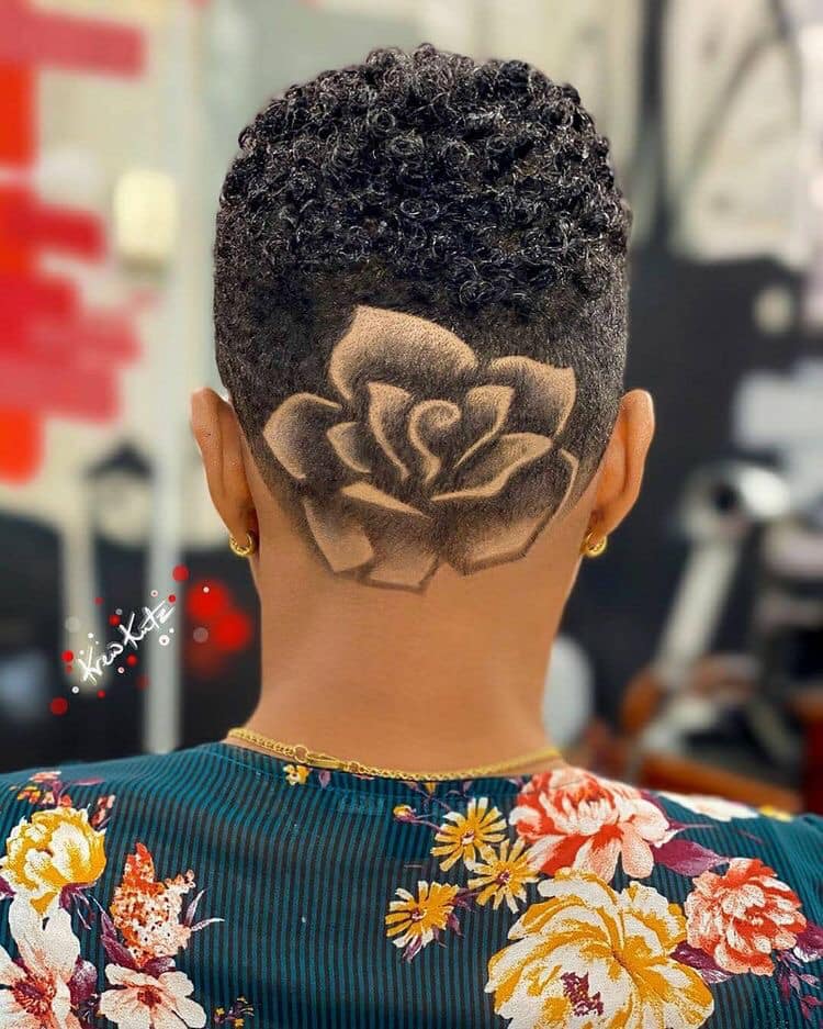 65 Fretwork in flower hair on the back above the nape of the man's neck