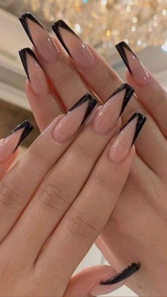 66 Black Acrylic tips in the shape of a black triangle with a pink background