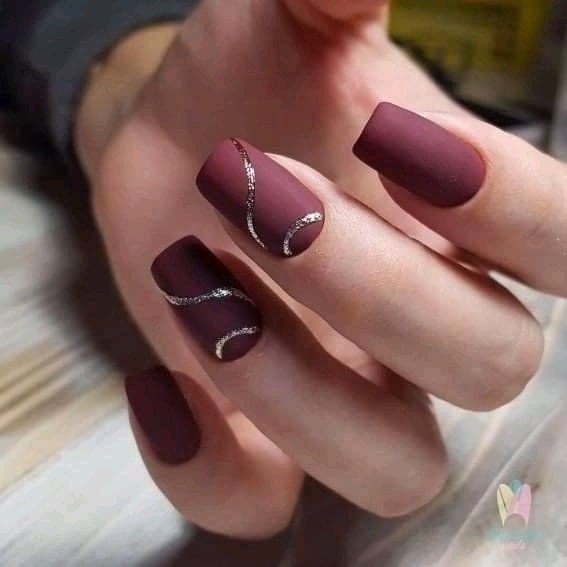 92 Opaque Wine color nails with curvy silver glitter trims