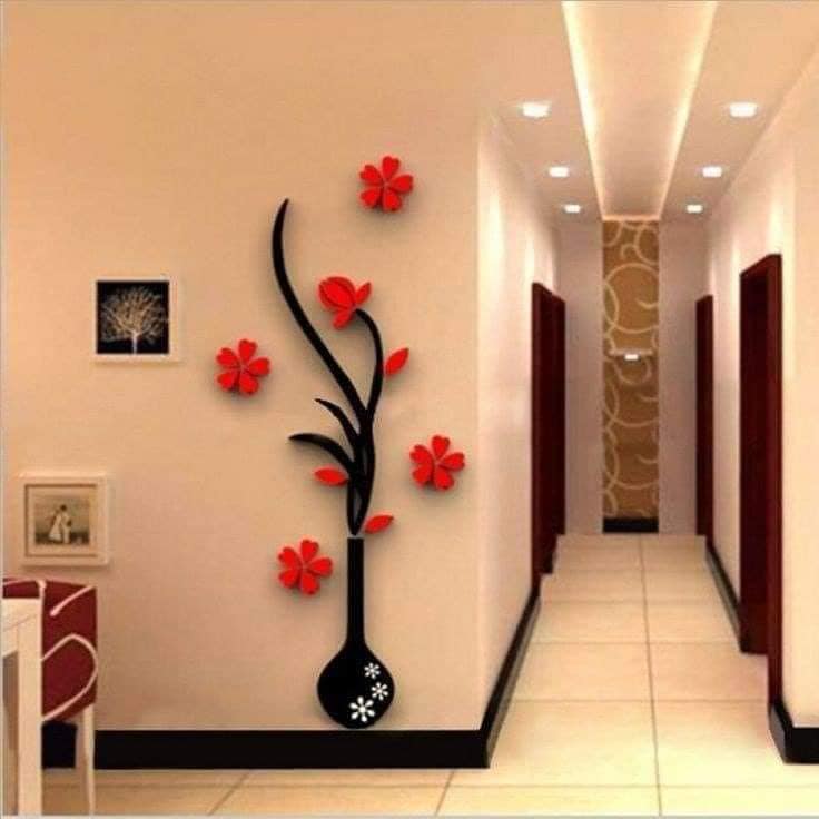 12 décorations murales fleurs rouges 3d faites en branches noires découpées au laser avec des murs vase baige