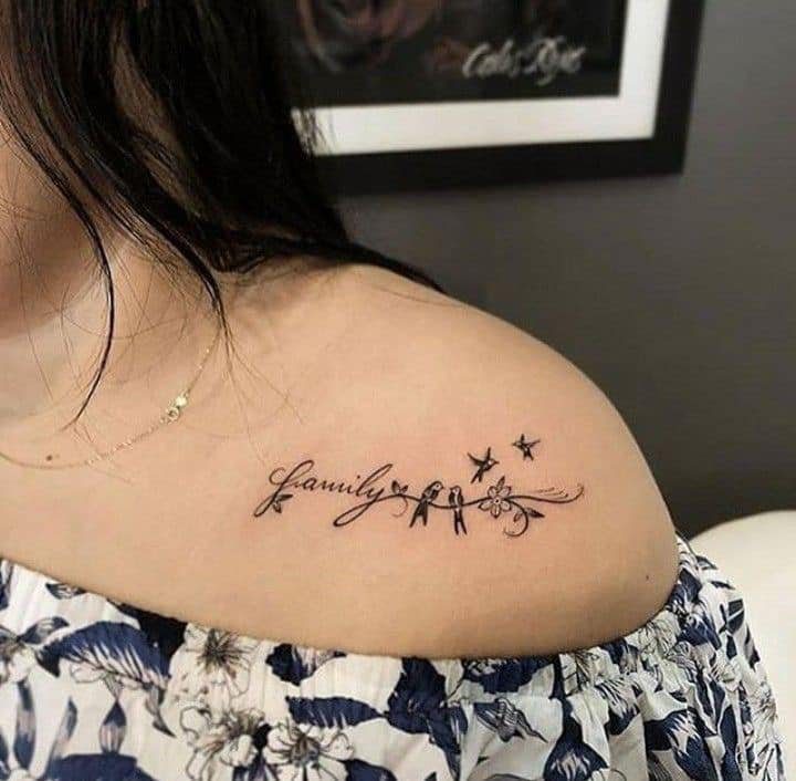 149 Tattoo on Shoulder and clavicle word family with two birds flying children and couple