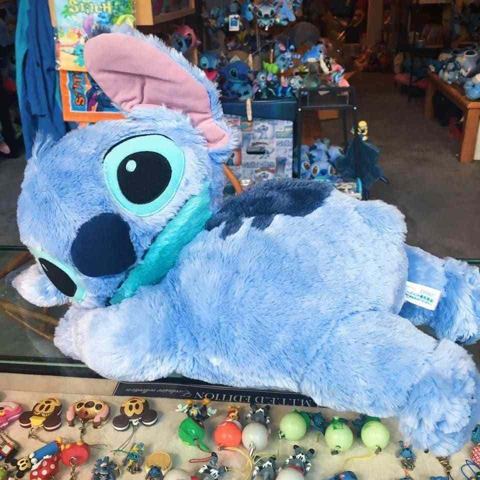 56 Stuffed Animals of Big Stitch lying down