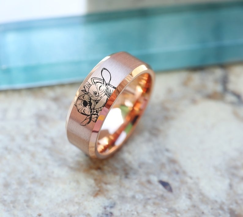 65 Golden Stitch ring with his girlfriend Angel