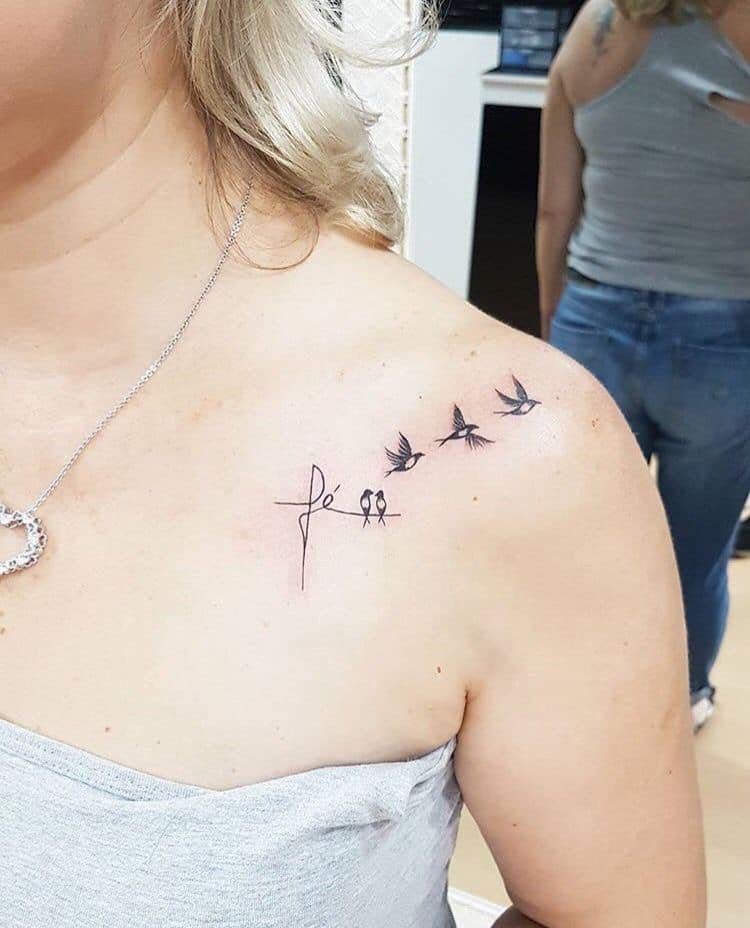 70 Tattoo on Shoulder and clavicle word faith with two couple birds and three children taking flight