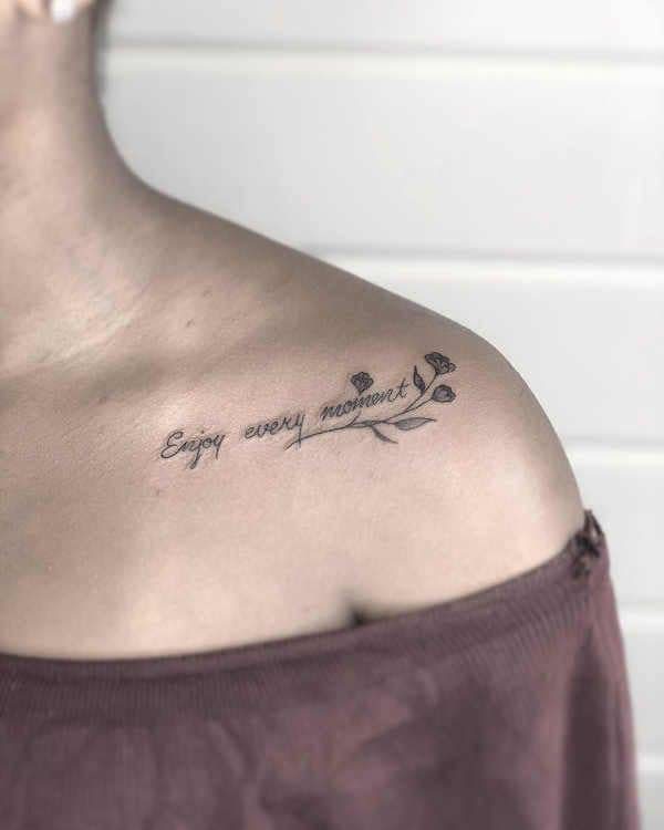 79 Tattoo on Shoulder and clavicle inscription enjoy all the moments with small black flowers