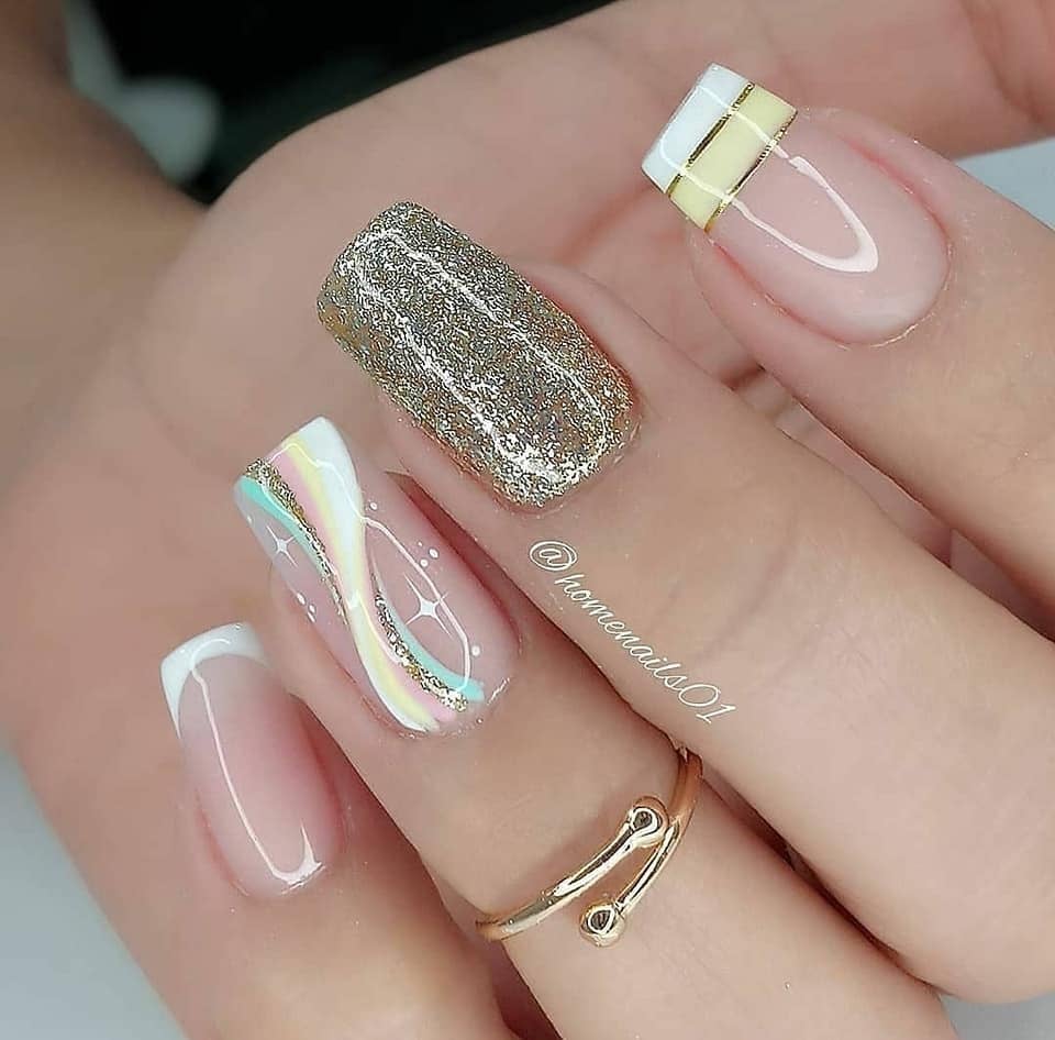108 Elegant pink nails with white and light blue drawings gold glitter stars