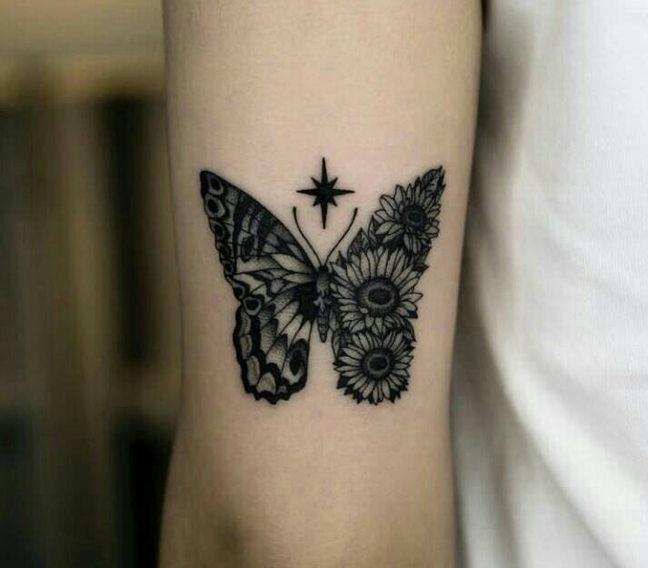 84 Ästhetische schwarze Tattoos Schmetterling, der einer Metamorphose eines Flügels aus Sonnenblumen und Sternen ähnelt