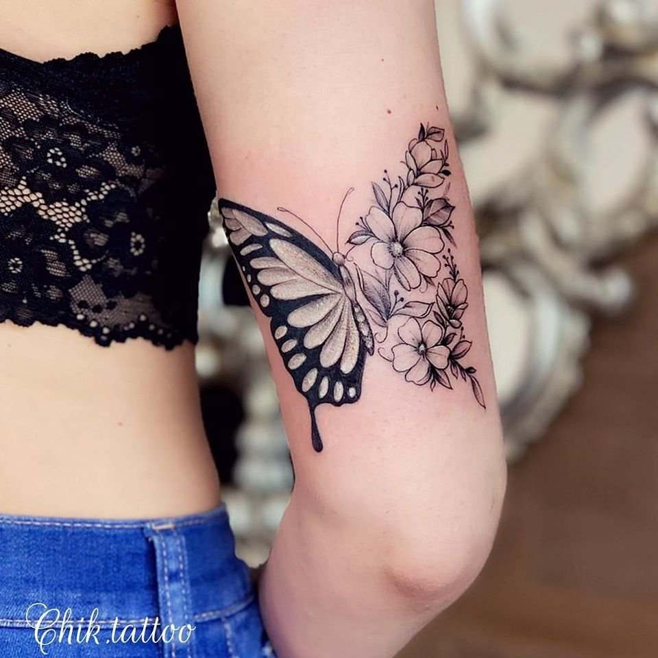 44 Farfalle Nere e Tatuaggi Metamorfosi sul retro del braccio