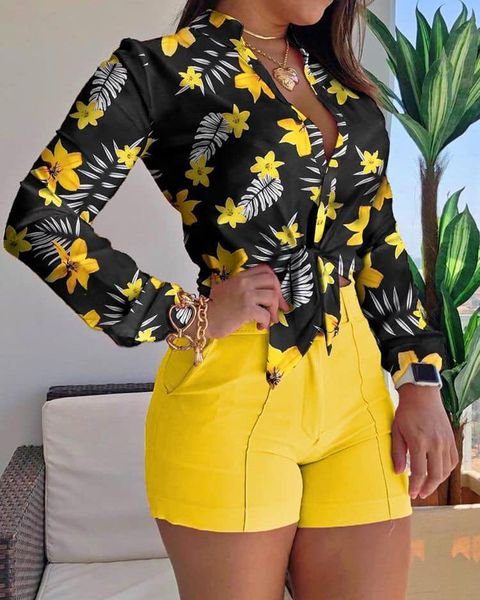 109 Yellow short with black blouse and yellow flowers