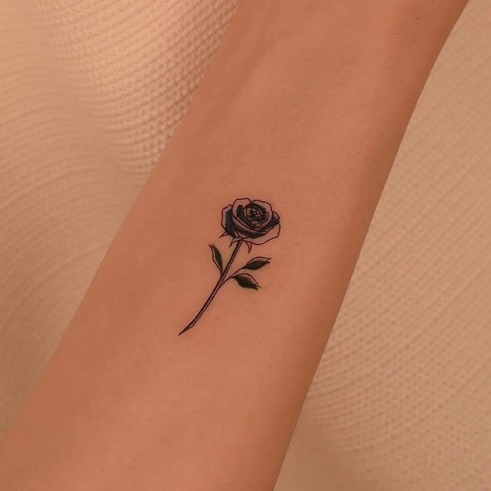 35 Simple Tattoos for Women Small black rose on forearm
