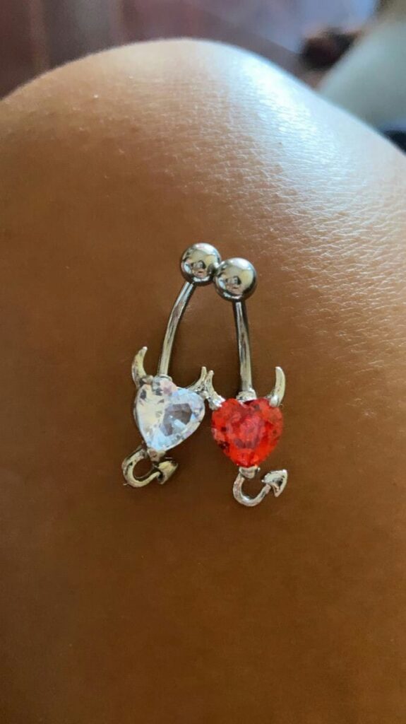 254 Navel Piercing two hearts of bright red and transparent stones with tail and devil horns in steel
