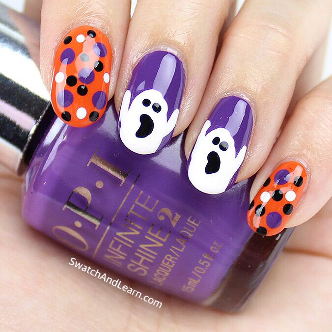 20 unghie decorate con fantasmi di Halloween in viola scuro e arancione brillante con cerchi colorati