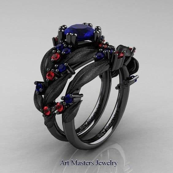 244 anillos de compromiso rubi rojo y topacio azul engarzados en metal negro