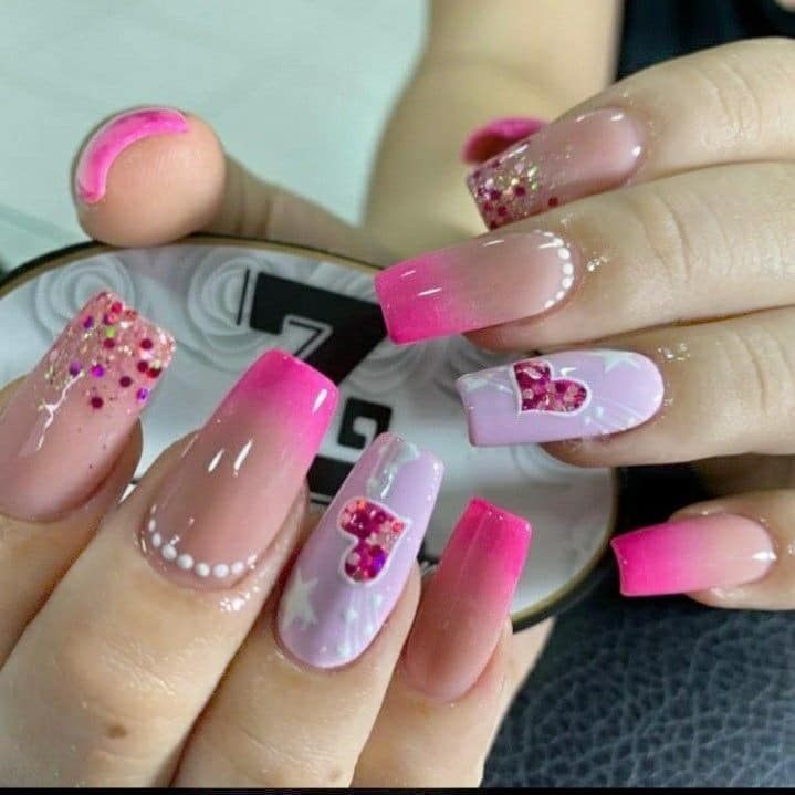 35.4 BEAUTIFUL NAILS WITH HEARTS with rhinestones in one and purple and pink tones