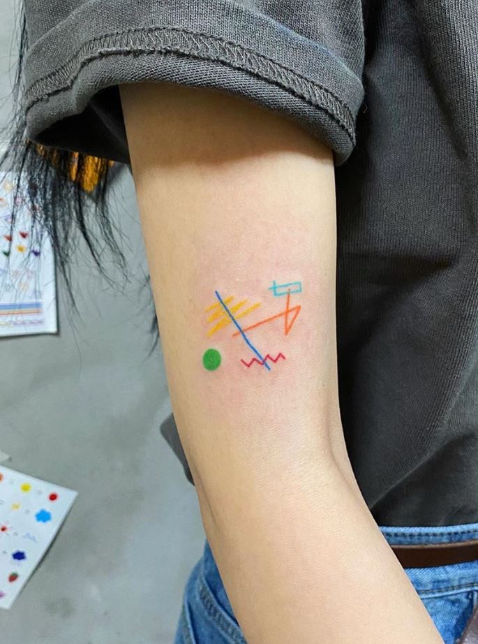 11 ORIGINAL SMALL TATTOOS colored lines and shapes on the arm