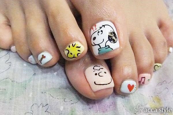 14.2 Pedicure for girls. with Snoopy and Charlie and different symbols in white