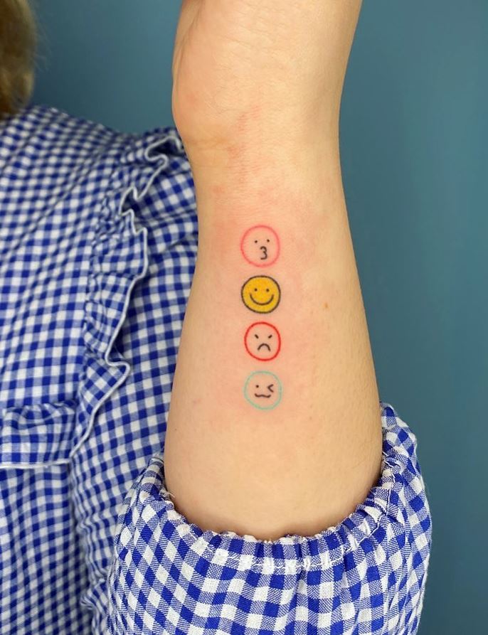 15.2 SMALL ORIGINAL TATTOOS different emojis of colored faces on the wrist