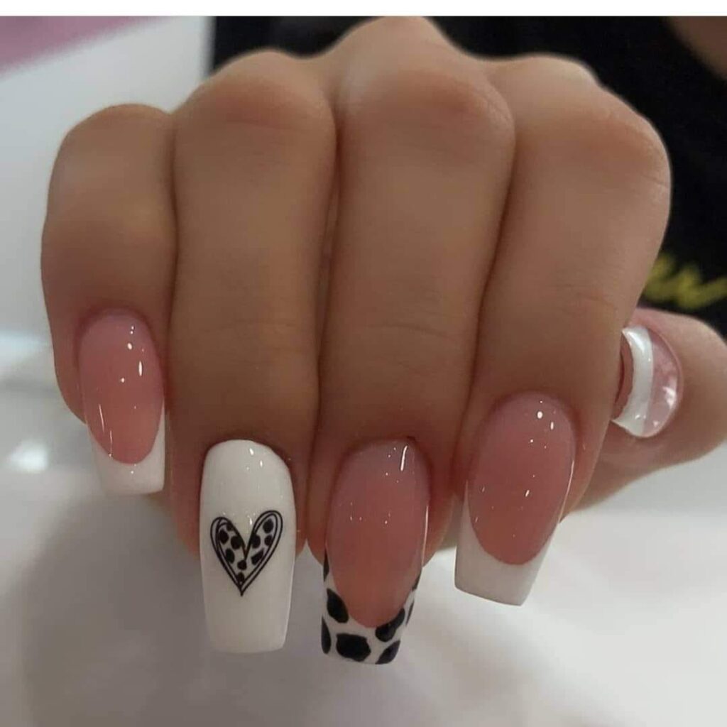 2942 Beautiful animal print nails in French manicure with leopard prints and animal heart print