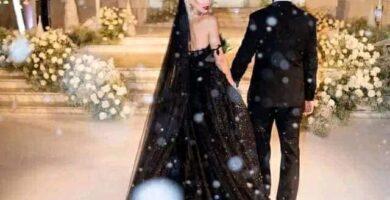 355 Boda en Negro pareja de novios vestida de negro en unos jardines de celebracion nevados