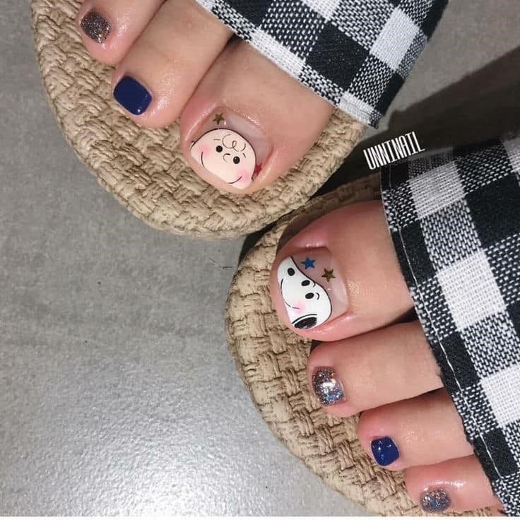 5.0 Pedicure for girls. Snoopy and Charlie with blue nail polish and glitter