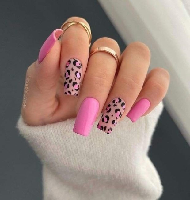 78 animal print nails alternated with pink and brown and black long square tips