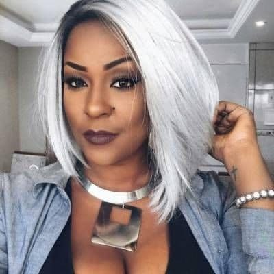 26 White hair in a layered cut with hair length to the lower part of the neck