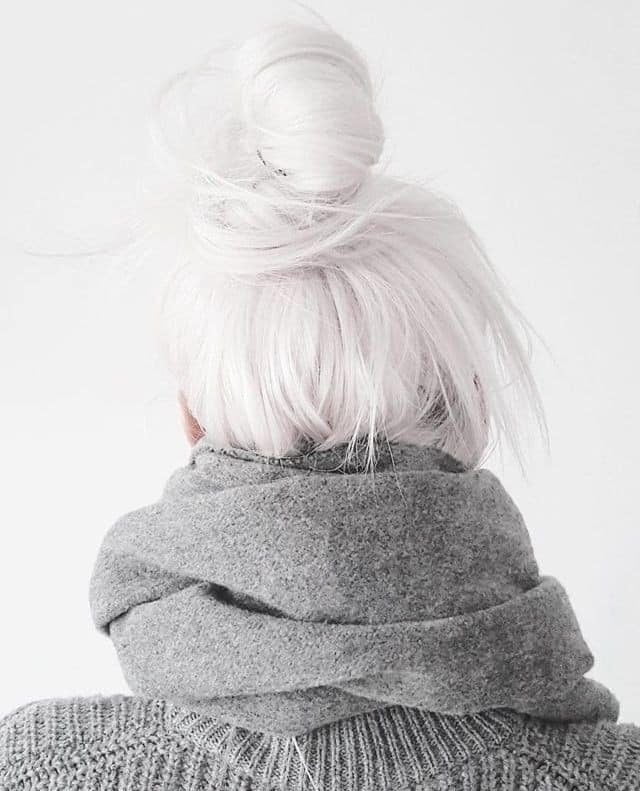 5 White hair straightened hair collected with high monkey