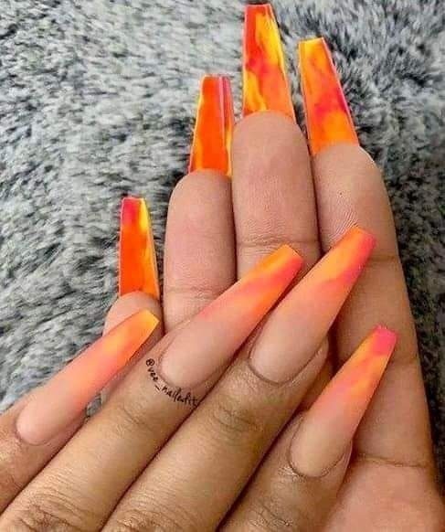 60 Double View long ballerina nails with fading in nude and orange tones reverse of nails in abstract design of orange and yellow tones