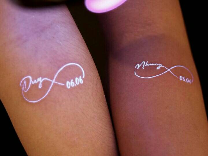 66 Tattoos with White on both arms infinity with date and names of twin children