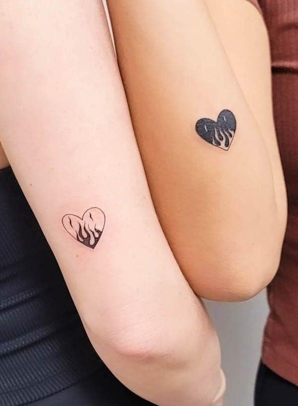 8 Originales tatuajes de mejores amigas corazon medio lleno y medio vacio en antebrazo