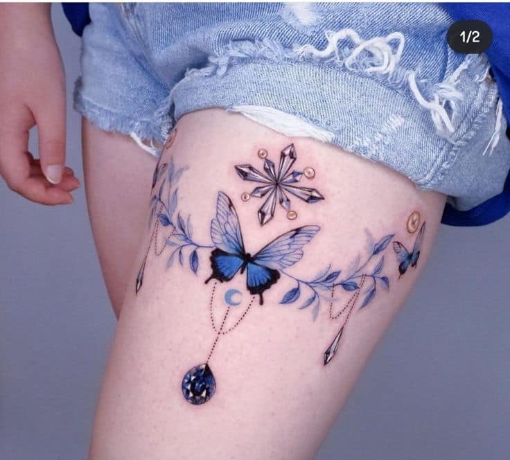 57 Tattoos IA adornos de mariposas colgante de piedra y cristales azules en muslo
