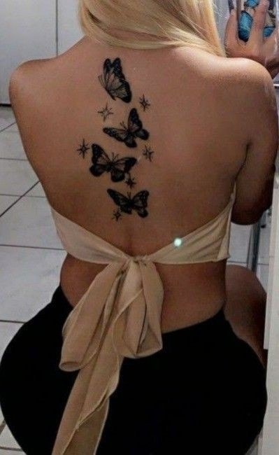 117 Tatoo en la espalda para mujer mariposas negras 117 Tatoo en la espalda para mujer mariposas negras