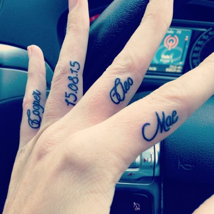 Cleo Mae Cooper Name Tattoos on Fingers