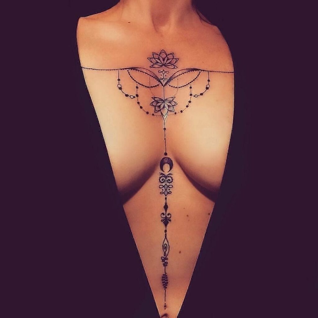 Tattoo Ideas for Women Unalome and Lotus Flower in the Middle of the Breasts