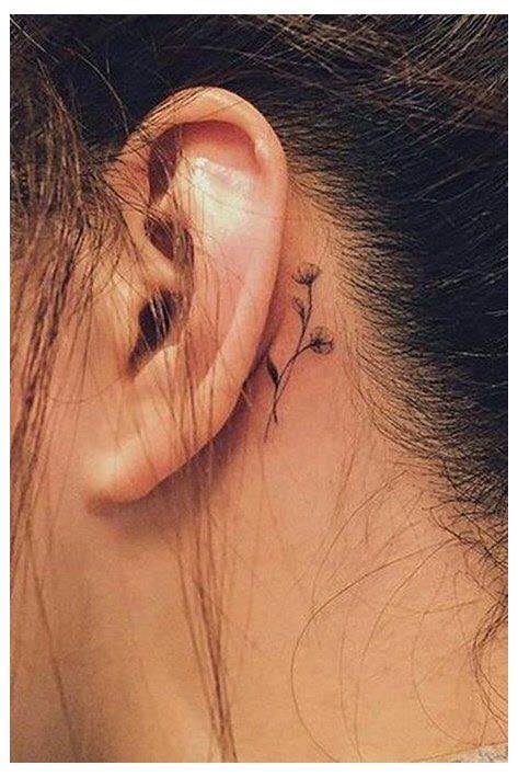 Piccolo tatuaggio floreale dietro l'orecchio 63 1