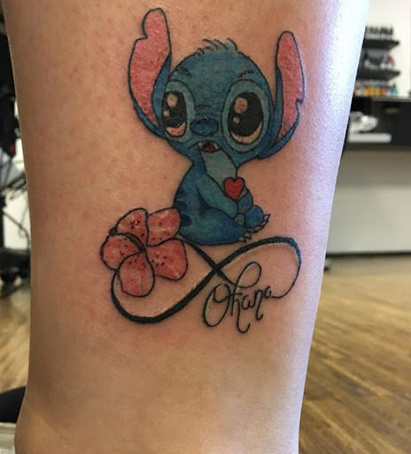 Stitch Ohana tattoo over the infinity symbol with a pink flower
