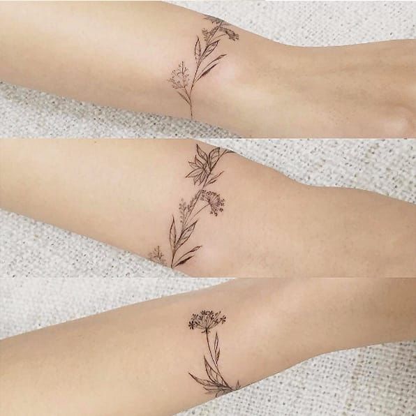Tatuagem de braçadeira ou pulseira Linhas finas de folhas e flores tipo dente-de-leão